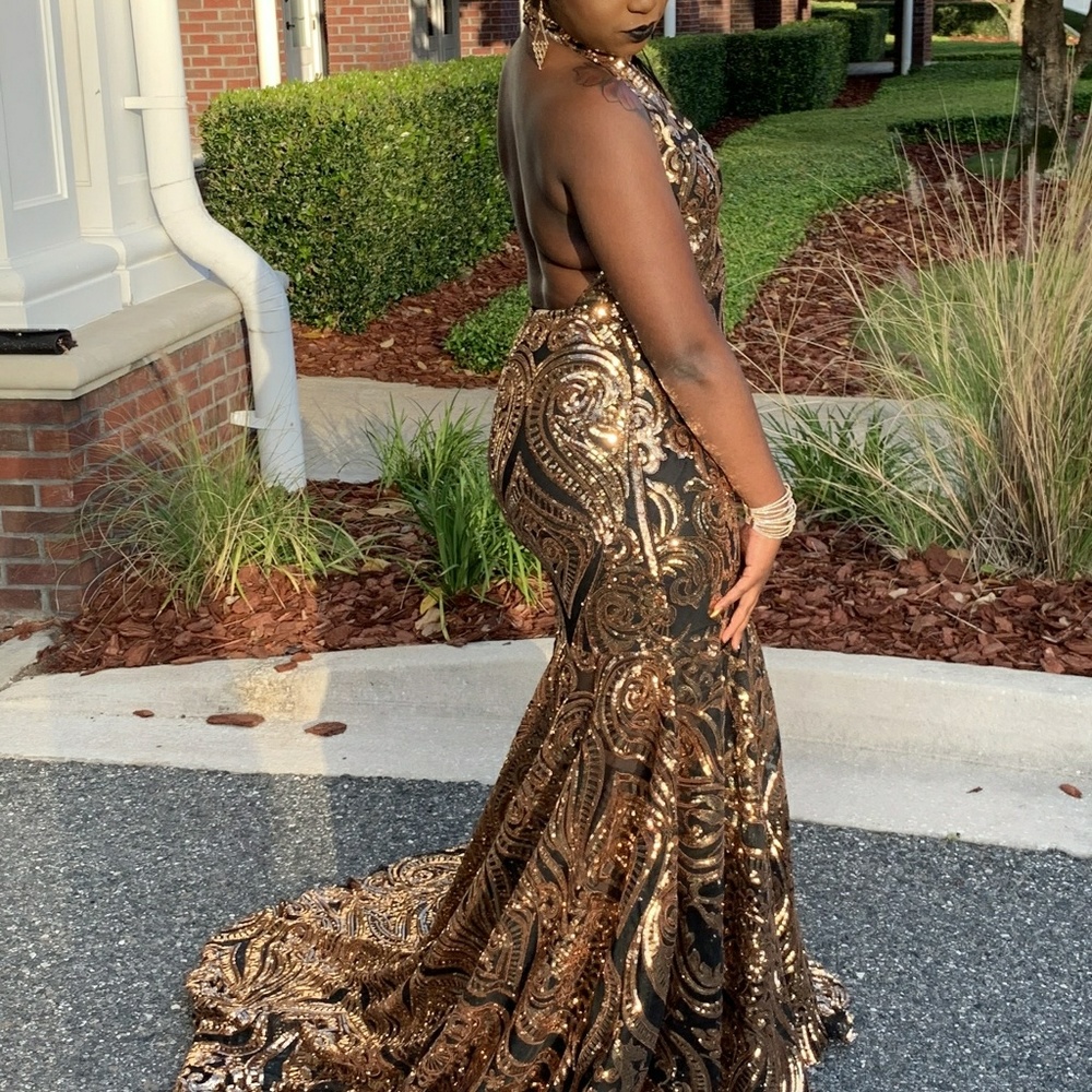 Black and gold sequence evening dress
